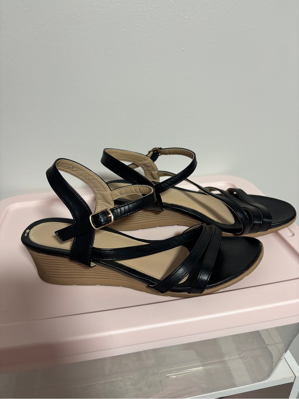 Strappy black wedge sandals